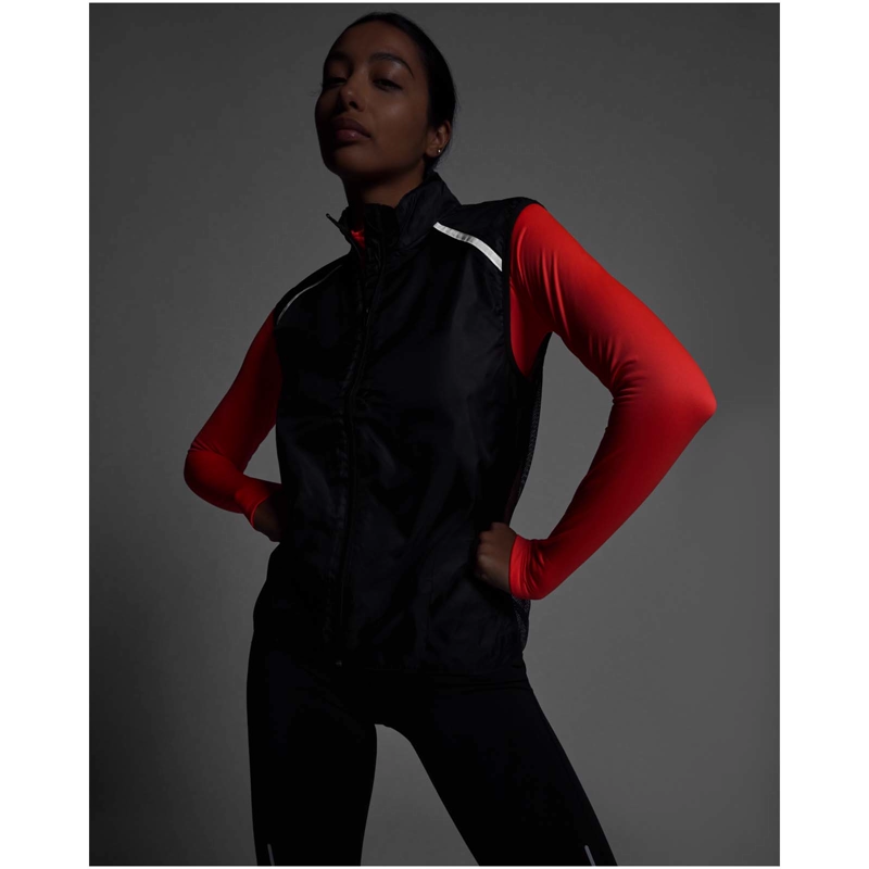 Jannu unisex letvægts bodywarmer til løb i farven Ensfarvet sort